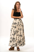 Long cotton muslin skirt with cream base and black botanical print tiers