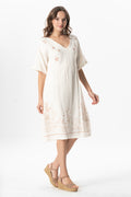 Off-white cotton short-sleeve V-neck dress front view with embroidered starfish motif