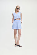 Light blue striped linen-blend shorts with elastic waist and drawstring, relaxed fit.