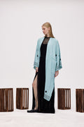 Light blue kimono robe with open front and embroidered cuffs, wide sleeves.