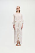 Cream asymmetric tiered skirt with lace-trimmed hem